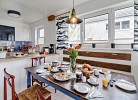 Ferienhaus Boje by Seeblick Ferien ORO, erste Wasserreihe, Kamin, 7Pers
