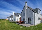 Ferienhaus Boje by Seeblick Ferien ORO, erste Wasserreihe, Kamin, 7Pers