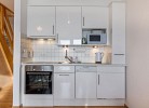 Inselblume 18 - Ferienwohnung mit Meerblick & Galerie in der Strandburg B3.4