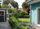 K 100 EG - stilvolle Ferienwohnung mit traumhaften Garten, Kinderspielplatz & Außenwhirlpool