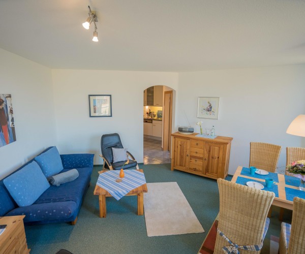 Inselblume 14 - Blaue Ferienwohnung mit Balkon am Südstrand