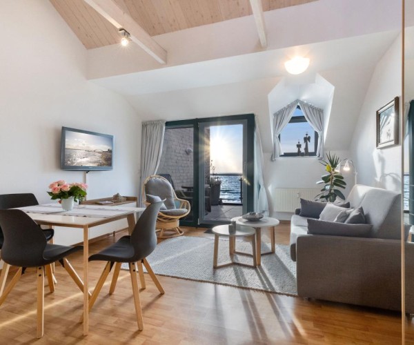 Inselblume 18 - Ferienwohnung mit Meerblick & Galerie in der Strandburg B3.4