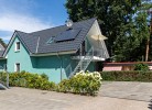 K 100 EG - stilvolle Ferienwohnung mit traumhaften Garten, Kinderspielplatz & Außenwhirlpool