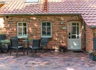 Friesenwind - Hochwertige Ferienwohnung mit Gartenoase