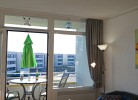 Inselblume 74 - Ferienwohnung mit Balkon am Yachthafen