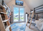 Ferienhaus Boje by Seeblick Ferien ORO, erste Wasserreihe, Kamin, 7Pers