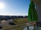 Inselblume 74 - Ferienwohnung mit Balkon am Yachthafen