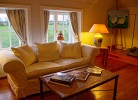 Inselblume 84 - Ferienhaus 'Reethus' mit Reetdach in Ostermarkelsdorf