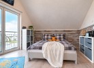 Ferienhaus Boje by Seeblick Ferien ORO, erste Wasserreihe, Kamin, 7Pers
