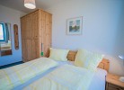 Inselblume 14 - Blaue Ferienwohnung mit Balkon am Südstrand