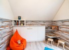 Ferienhaus Boje by Seeblick Ferien ORO, erste Wasserreihe, Kamin, 7Pers