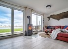 Ferienhaus Boje by Seeblick Ferien ORO, erste Wasserreihe, Kamin, 7Pers