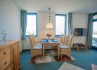 Inselblume 14 - Blaue Ferienwohnung mit Balkon am Südstrand