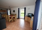 Schoenes Ferienhaus mit Kamin fuer die ganze Familie direkt am See in Roebel