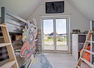 Ferienhaus Boje by Seeblick Ferien ORO, erste Wasserreihe, Kamin, 7Pers