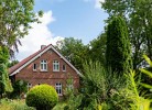 Friesenwind - Hochwertige Ferienwohnung mit Gartenoase