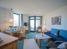Inselblume 14 - Blaue Ferienwohnung mit Balkon am Südstrand
