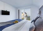 Fewo Kapitän James Cook Olpenitz by Seeblick Ferien, allergikerfreundlich, Wasserbett, 3Zi. Top Lage, E-Ladesäule, XXL- Wellnesdusche