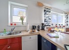 Ferienhaus Boje by Seeblick Ferien ORO, erste Wasserreihe, Kamin, 7Pers