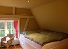 Inselblume 84 - Ferienhaus 'Reethus' mit Reetdach in Ostermarkelsdorf