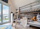 Ferienhaus Boje by Seeblick Ferien ORO, erste Wasserreihe, Kamin, 7Pers