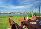 Ferienhaus Boje by Seeblick Ferien ORO, erste Wasserreihe, Kamin, 7Pers