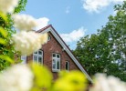Friesenwind - Hochwertige Ferienwohnung mit Gartenoase
