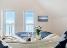 Ferienhaus Am Meer by Seeblick Ferien ORO, direkte Wasserlage,Sauna,Kamin