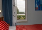 Ferienzimmer Uferschwalbe mit Terrasse und traumhaftem Seeblick