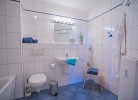 Inselblume 14 - Blaue Ferienwohnung mit Balkon am Südstrand