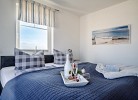 Ferienhaus Strand Hus mit Strandzugang by Seeblick Ferien ORO