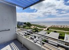 Inselblume 59 - Moderne Ferienwohnung mit Meerblick am Südstrand