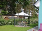 K 100 EG - stilvolle Ferienwohnung mit traumhaften Garten, Kinderspielplatz & Außenwhirlpool