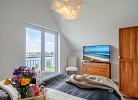 Ferienhaus An der Ostsee by Seeblick Ferien ORO, direkte Wasserlage,Sauna,E-Säule