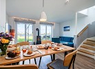 Ferienhaus An der Ostsee by Seeblick Ferien ORO, direkte Wasserlage,Sauna,E-Säule