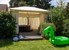 K 100 EG - stilvolle Ferienwohnung mit traumhaften Garten, Kinderspielplatz & Außenwhirlpool